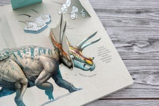 В мире динозавров. Книжка с окошками фото книги 4