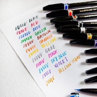 Браш пен "Brush Sign Pen Artist. Ultra Fine", оранжевый цвет фото книги 5